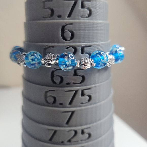 NWT Turtle Charms W Ocean Blue Glow In The Dark Firefly Glass Stretch Bracelet - Picture 4 of 14